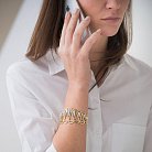Жіночий браслет з жовтого золота з фіанітами б00004ж от ювелирного магазина Оникс