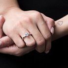 Серебряное помолвочное кольцо с фианитом 111864 от ювелирного магазина Оникс - 1