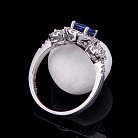 Золотое кольцо с синим сапфиром и бриллиантами к414 от ювелирного магазина Оникс - 1