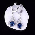 Жіночі сережки з "Лондон блакитним" топазом (фіаніти) 121393 от ювелирного магазина Оникс