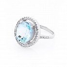 Серебряное кольцо с голубым топазом и фианитами 111517 от ювелирного магазина Оникс - 1