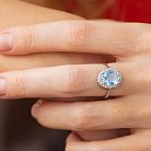 Серебряное кольцо с голубым топазом и фианитами GS-01-134-3910 от ювелирного магазина Оникс - 1