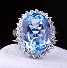 Женское кольцо с голубым топазом (фианиты) 111427 от ювелирного магазина Оникс