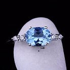Женское кольцо с голубым топазом (фианиты) 111429 от ювелирного магазина Оникс