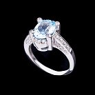 Серебряное кольцо с голубым топазом 111548 от ювелирного магазина Оникс - 1
